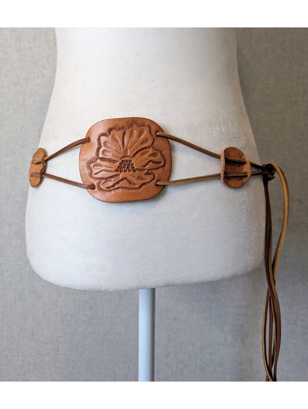 Vintage tooled leather floral medallion tie belt